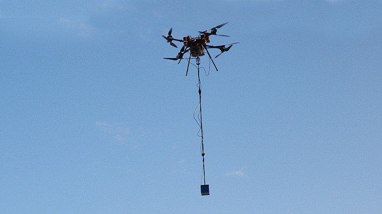 MGT octocopter carrying a suspended electromagnetic receiver